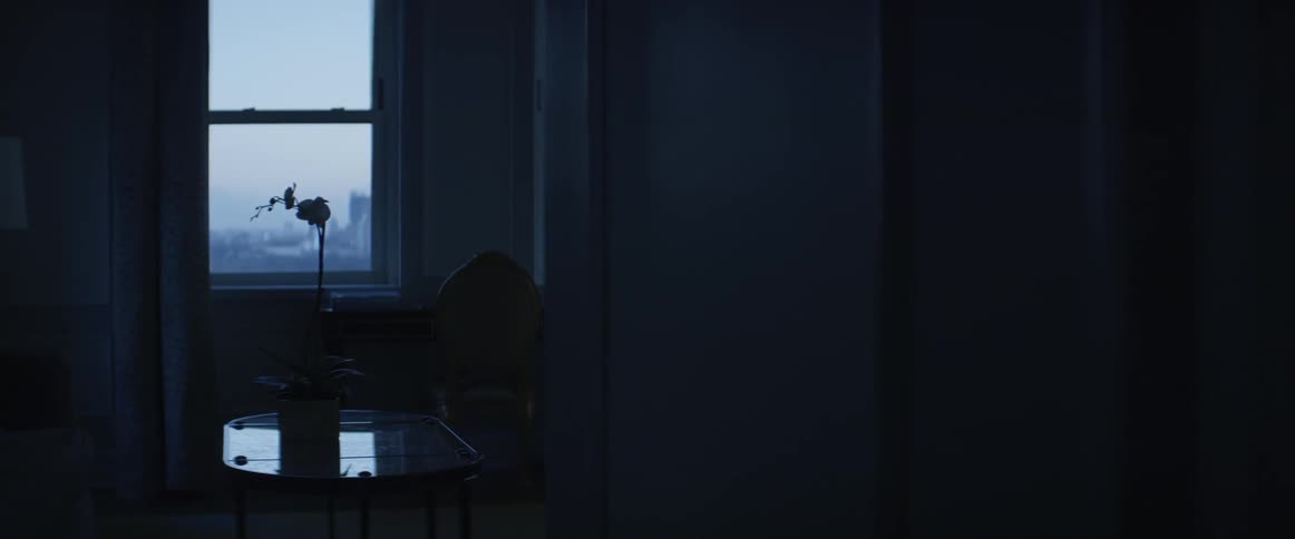 An empty room with a desk