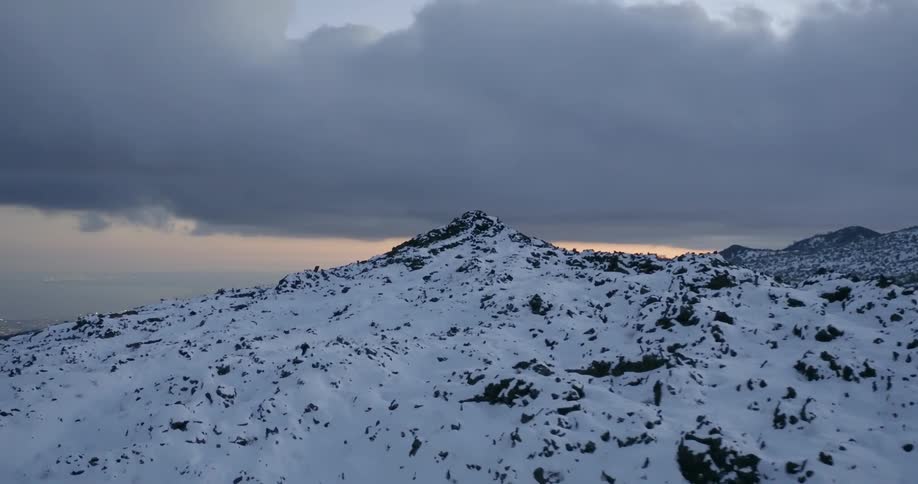 A snow covered mountain top