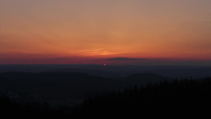 A drone films the sun sitting