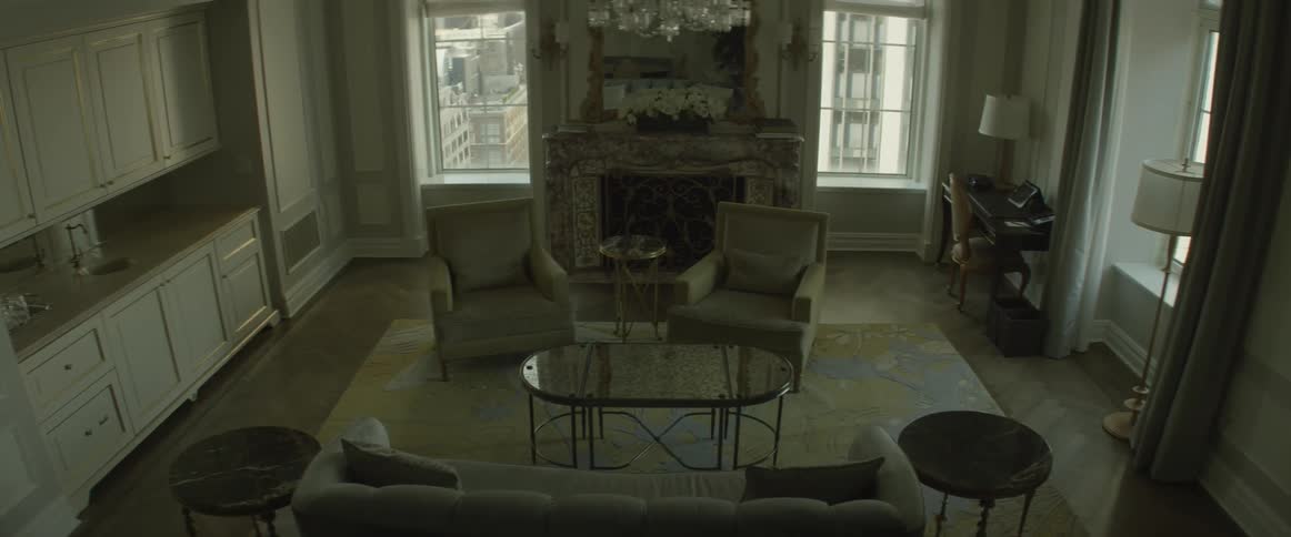 Living room furniture sits in an apartment