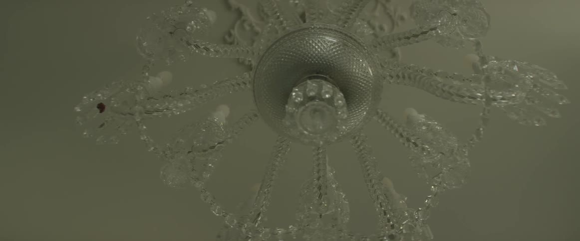 A chandelier hangs from the ceiling