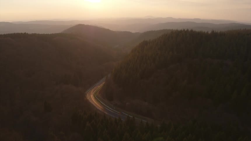 A drone is flying over a forest