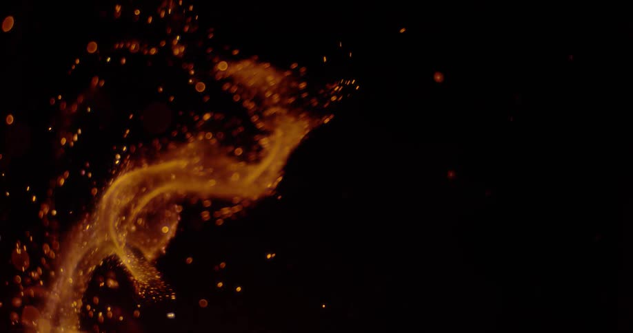 Flames writhe in a dark room