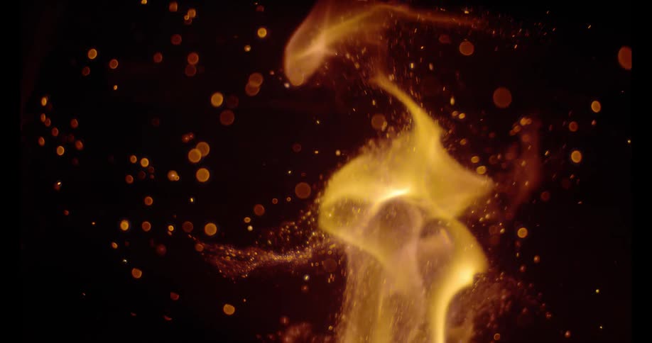 Flames spark and curl