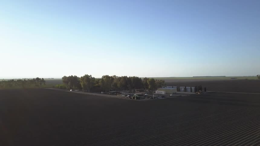 A drone is flying over a farm