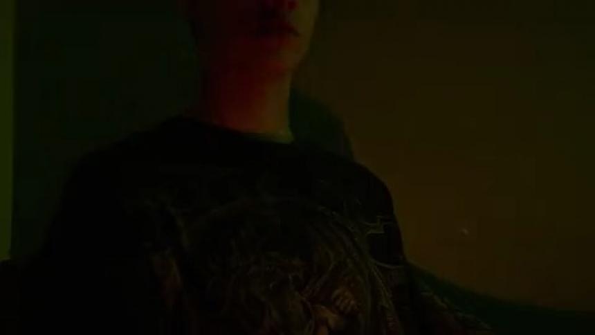 Man stands in the dark