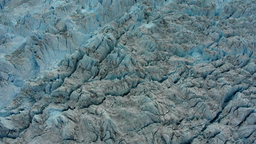 Ice and snow cover the landscape