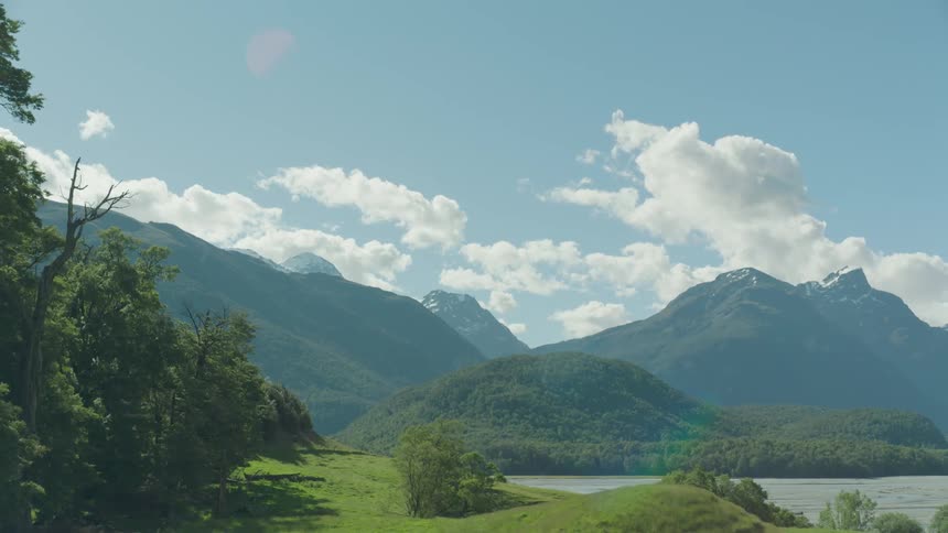 A valley and mountain range is being filmed