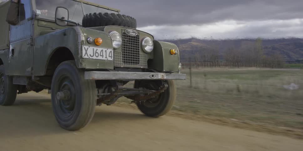 A person driving a jeep