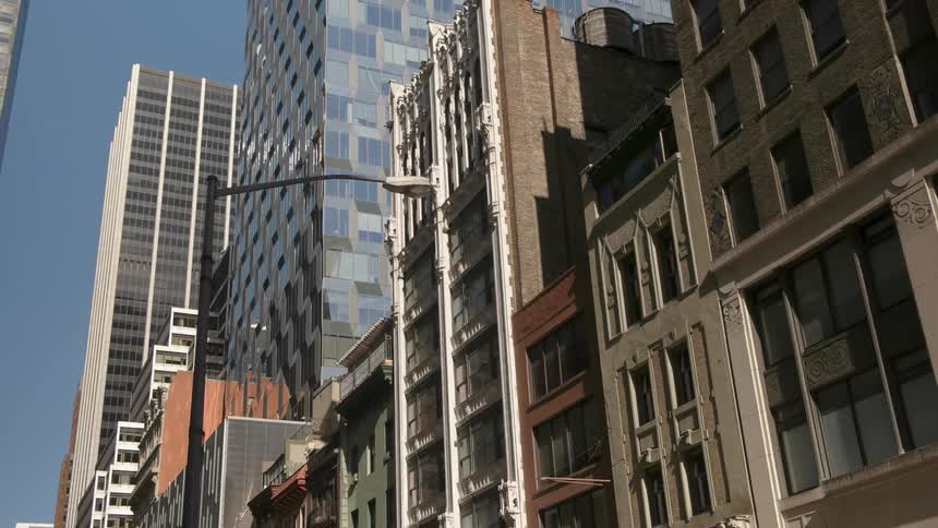 The buildings are tall with many windows