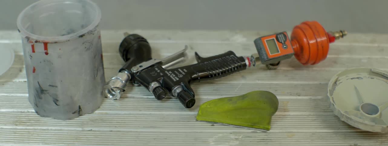 Gauges and tools are on a bench