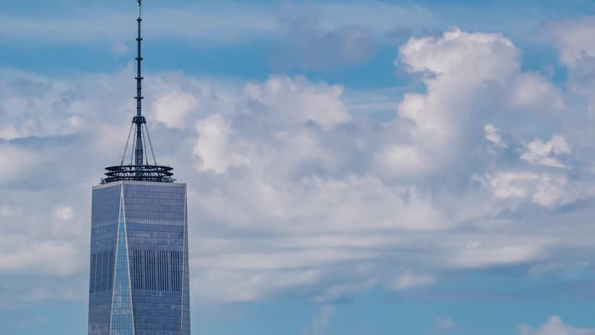 The clouds move fast past the tower