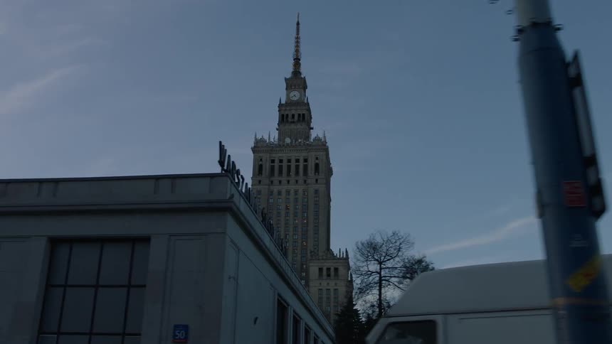 View of a large building with a clock on the top