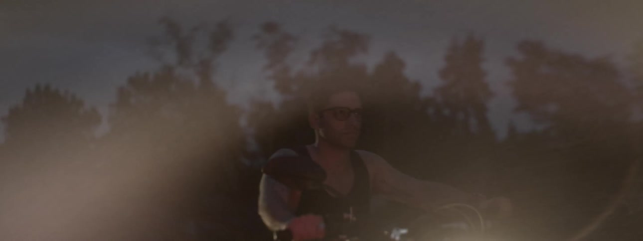 A man rides a motorcycle at night