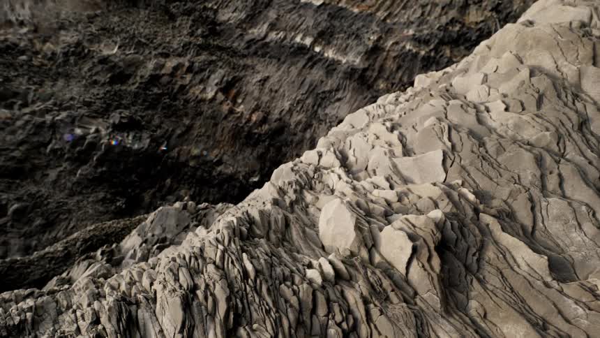 Ridged mountain sits under the sky