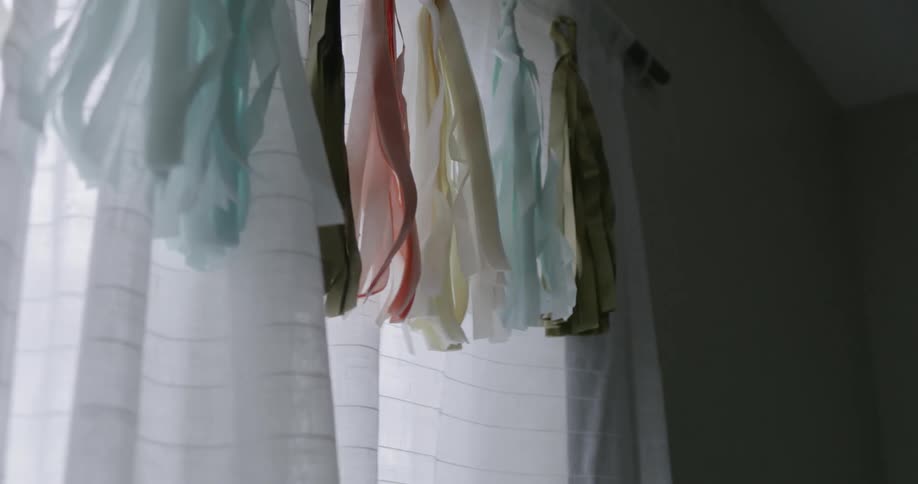 Curtains wave in the breeze