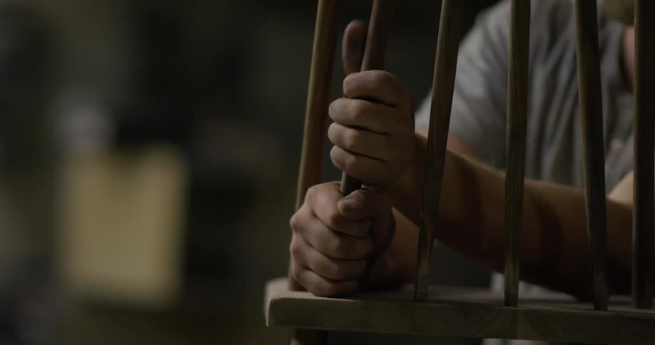 A man is building a chair