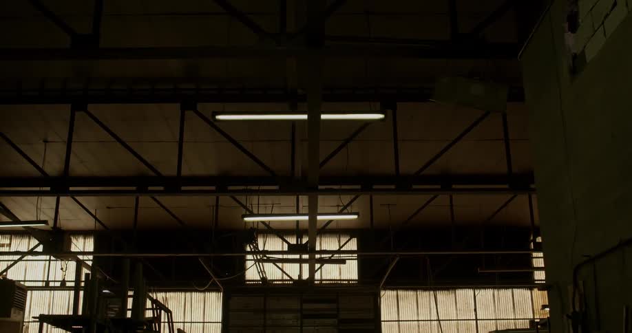 Lights illuminate inside a building
