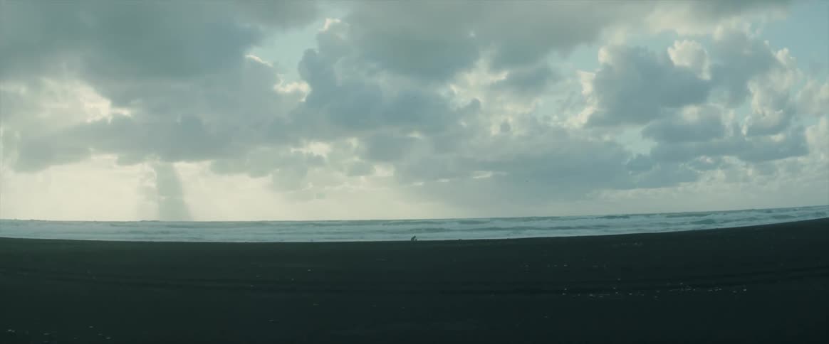 Clouds float above the ocean