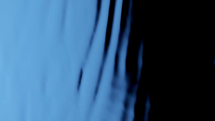 Water ripples and flows onto shore