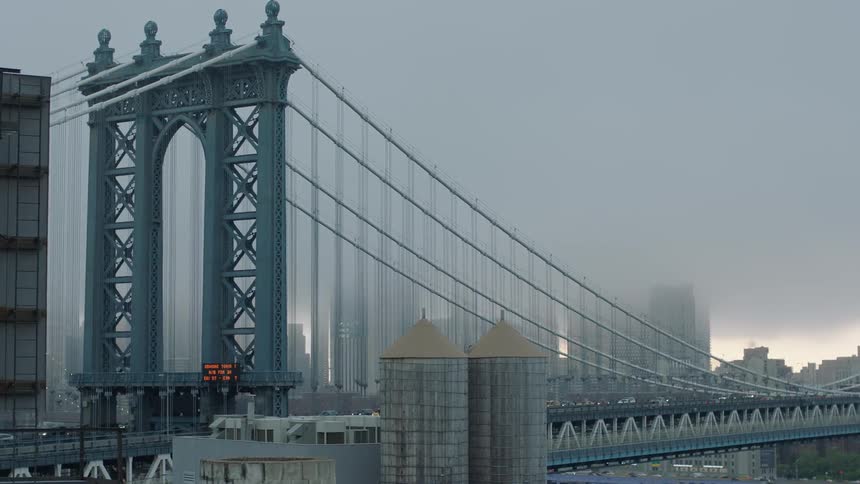 A foggy city bridge