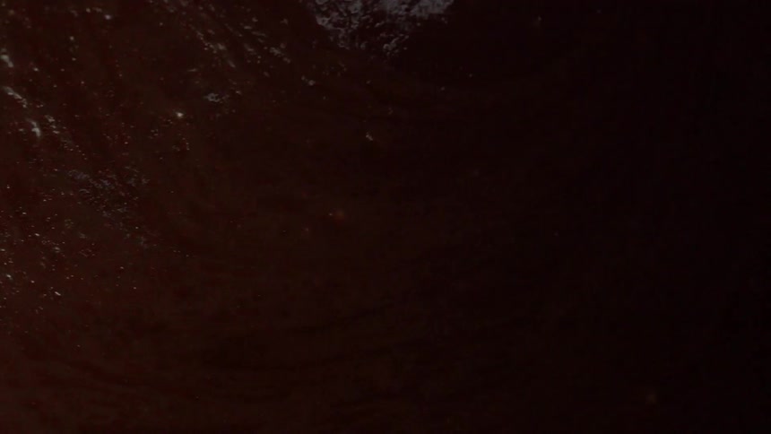 Chocolate is mixed in a container