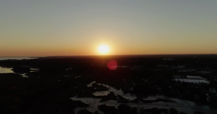A drone is filming the sunset during winter