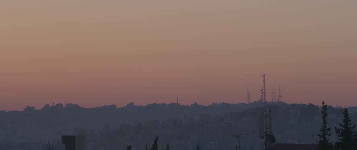 A city skyline at sunset