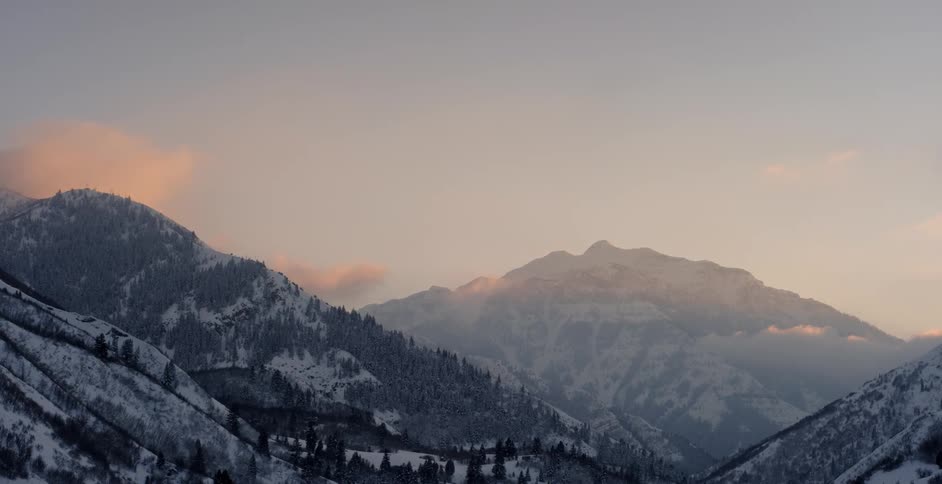Snowy mountains at sunrise