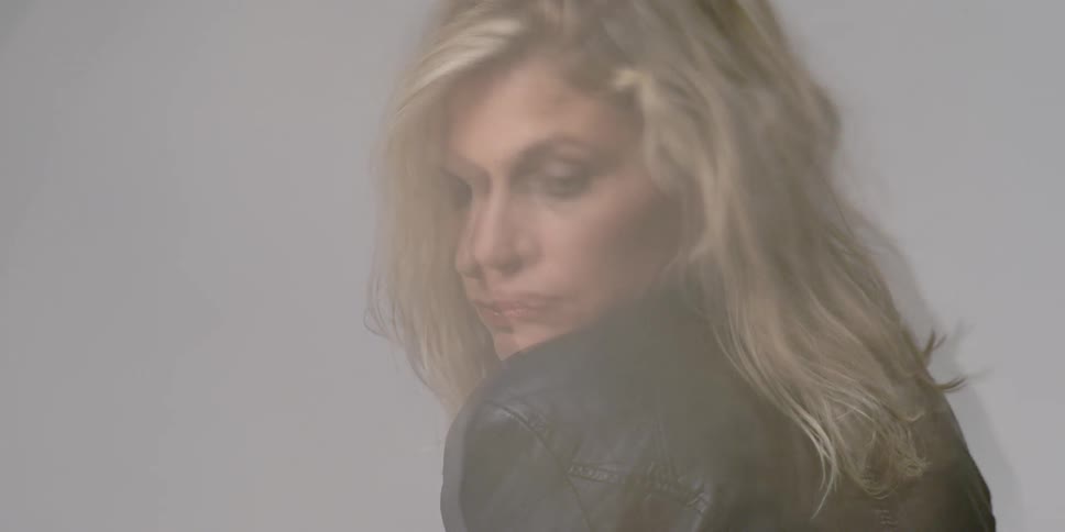 Woman looks back over her shoulder