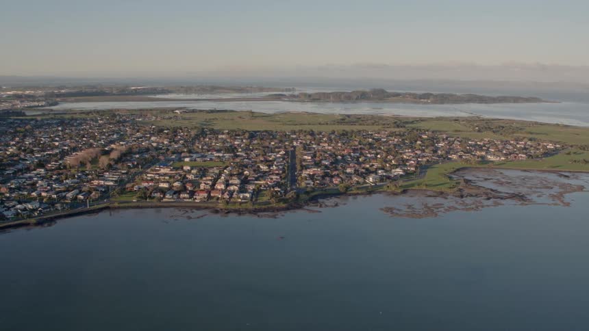 A small town is filmed from a drone from far away