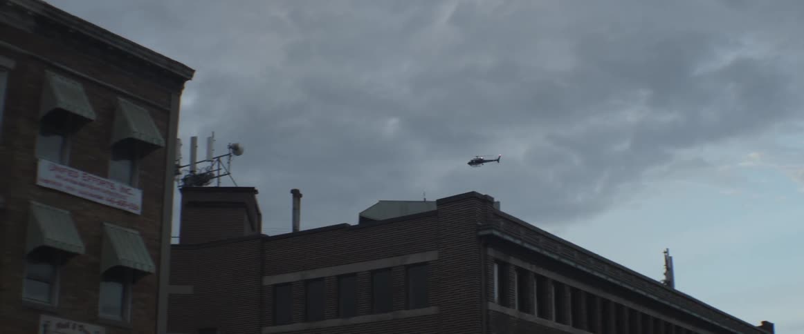 Helicopter flying over a city
