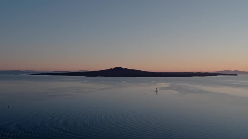 Large lake rippling at sunset
