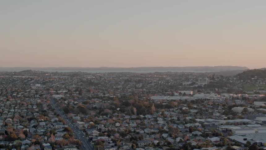 Aerial view of a city at sunrise