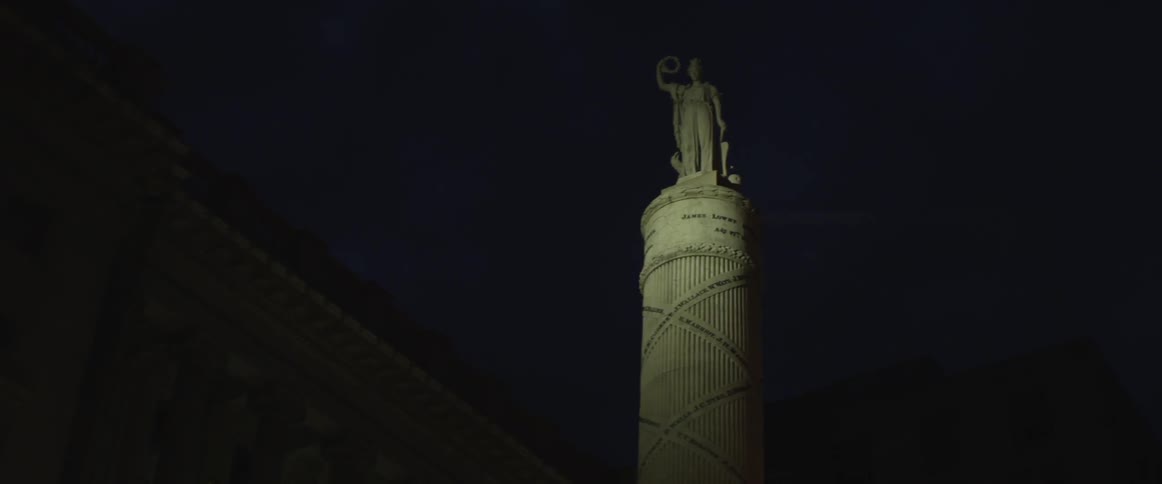 A spotlight on a statue