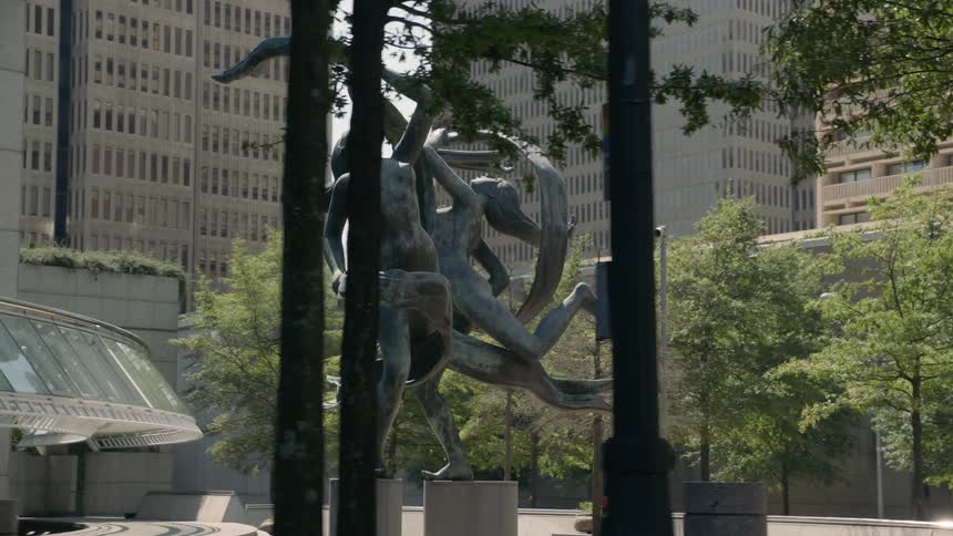 A statue in front of a building