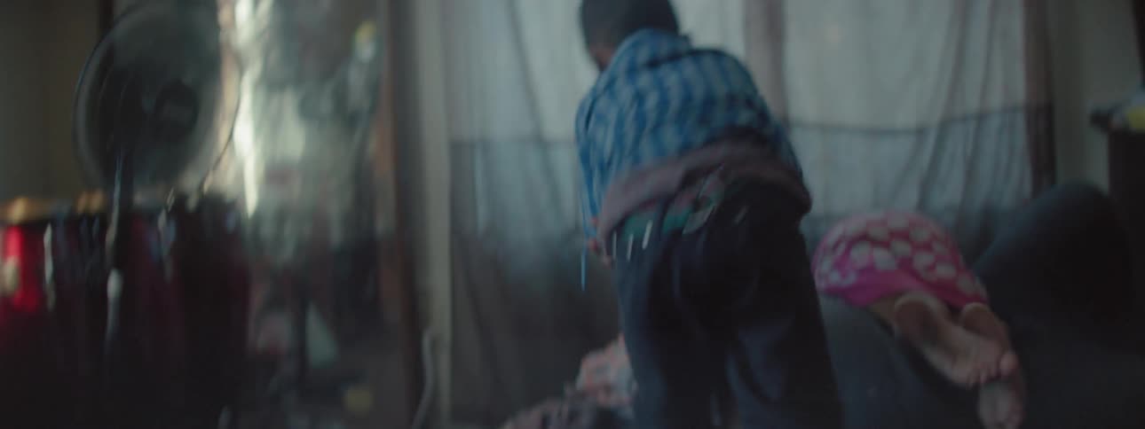 A man plays with two children