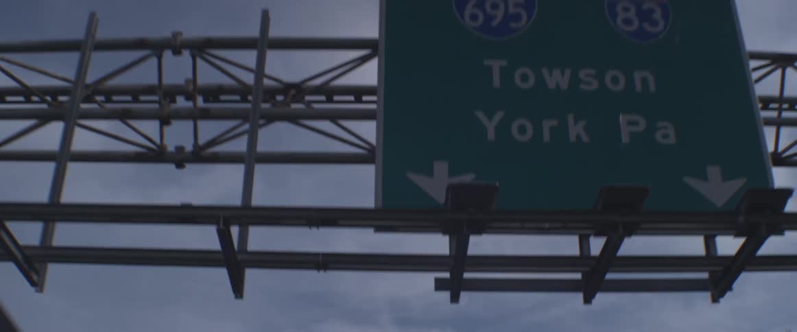 Interstate signs on a cloudy day