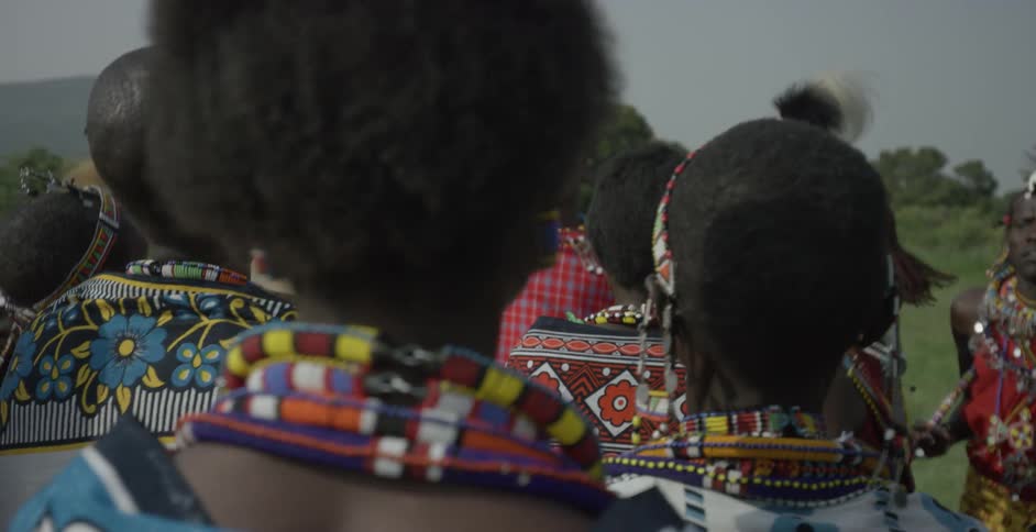 Group of maasai jumping up and down