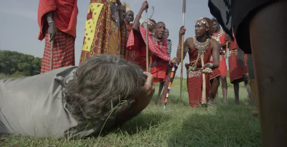 A photographer is taking photos of maasai