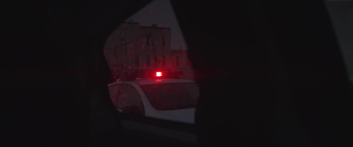 View of the police sirens through a car window