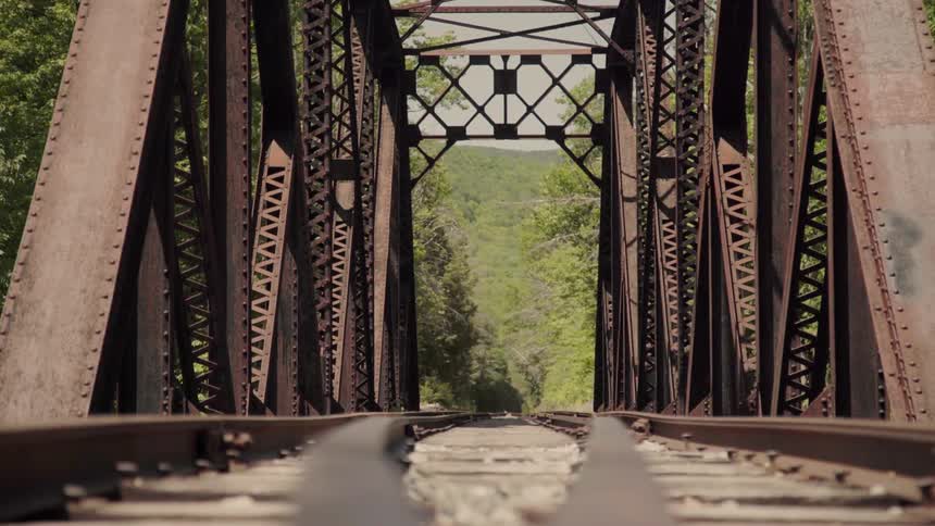 A train track on a metal bridge