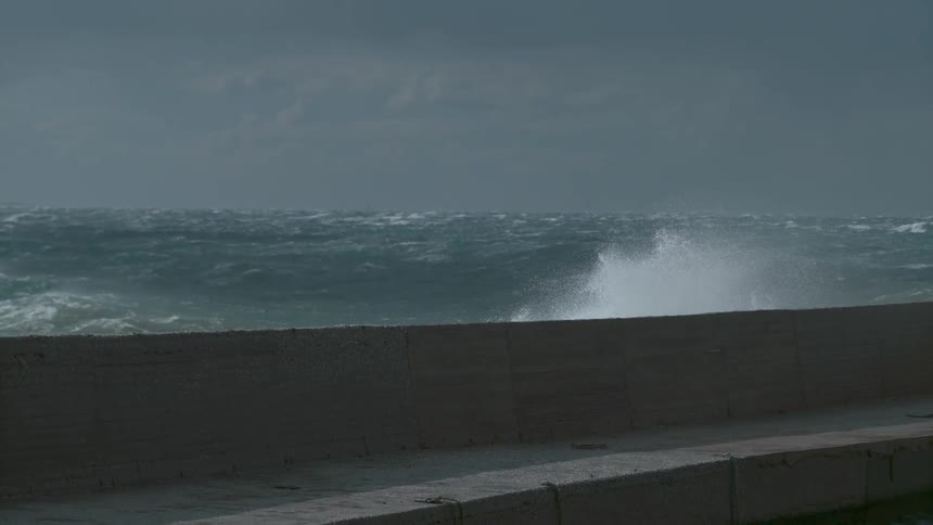 Waves crashing against the beach