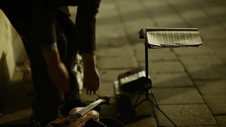 A musician is done playing a song