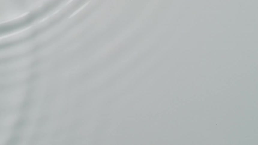 White liquid starts to ripple