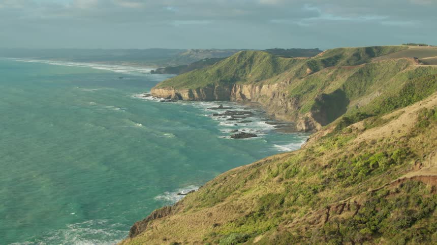 Cliffs rising over the ocean,