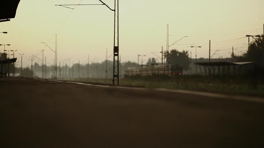 A train is rolling through a town