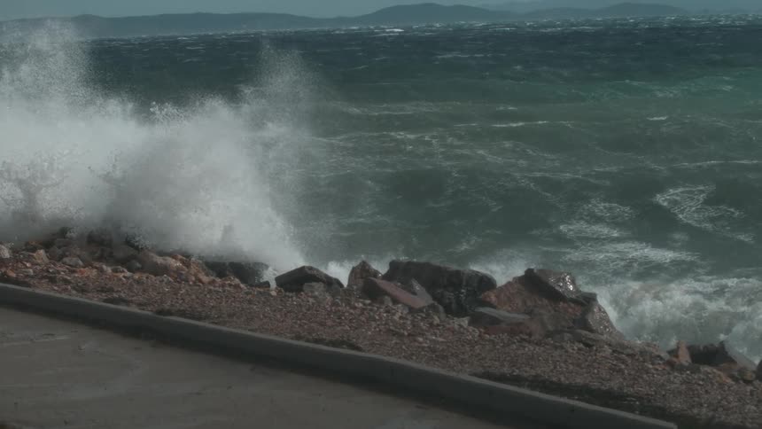 Waves crash onto a rocky beach