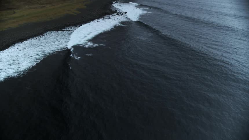 Waves roll toward the shore during the day