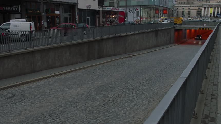A car drives out of a tunnel